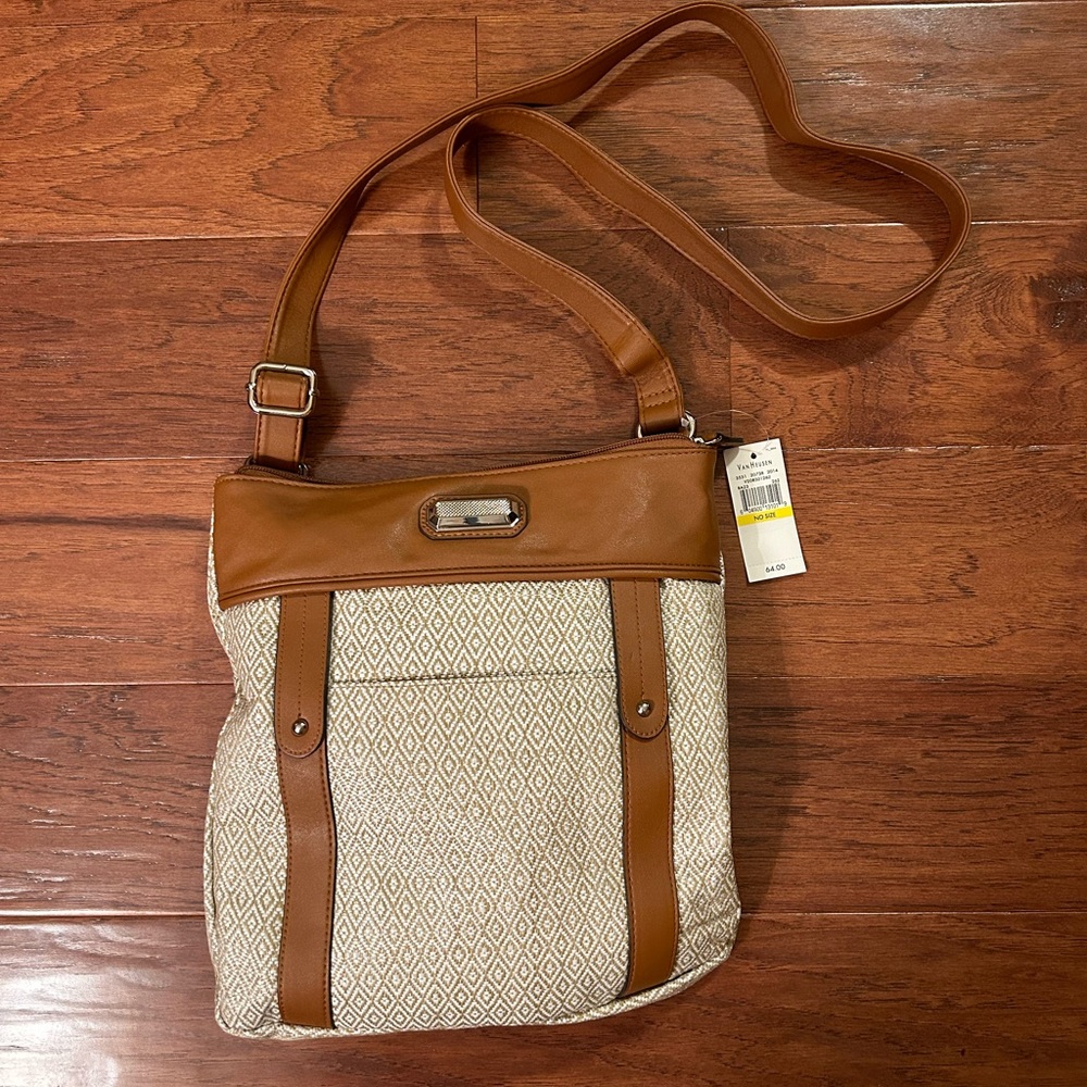 NWT Van Heusen purse. Adjustable strap, zipper closure. Plenty of room.